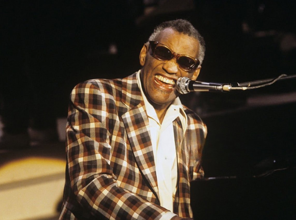 Ray Charles performs “Hit the Road Jack” on piano, 1964.